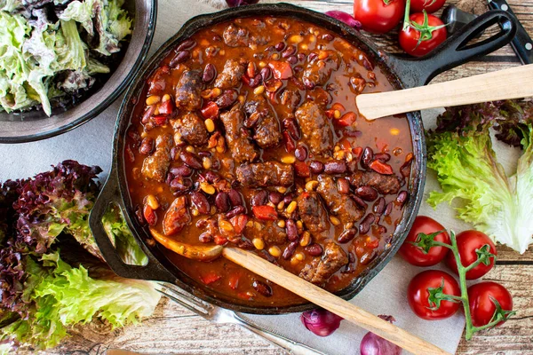 Minced Meat Stew Kidney Beans Served Wooden Spoon Rustic Cast — Stock Photo, Image