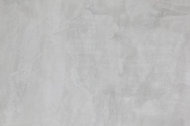 Soyut arka plan ve tasarım amacı için kırsal doğal dokuya sahip gri beton duvar