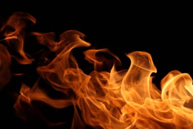 Soyut grafik tasarım amacı için koyu arkaplanda alev yakmak