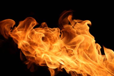 Soyut grafik tasarım amacı için koyu arkaplanda alev yakmak