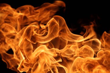 Soyut grafik tasarım amacı için koyu arkaplanda alev yakmak