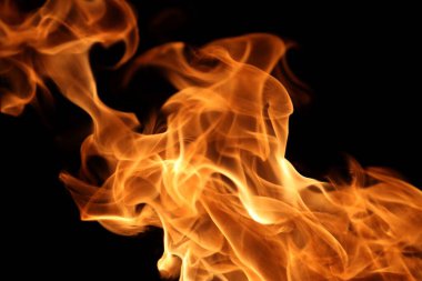 Soyut grafik tasarım amacı için koyu arkaplanda alev yakmak