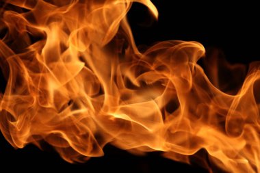 Soyut grafik tasarım amacı için koyu arkaplanda alev yakmak