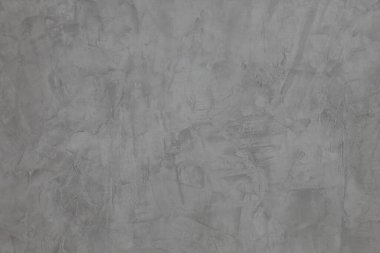 Soyut arka plan ve tasarım amacı için kırsal doğal dokuya sahip gri beton duvar