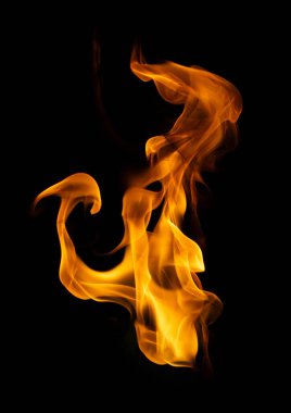 Ateş ve yanan alev grafik tasarımı için koyu arkaplanda izole edildi