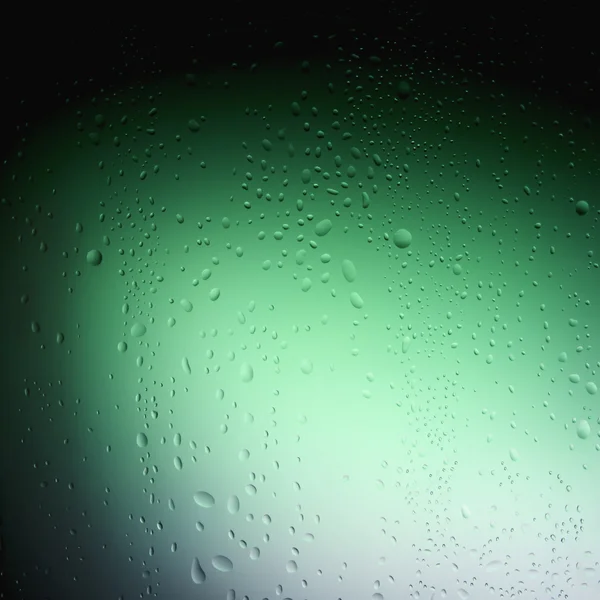 Gotas de agua sobre fondo verde —  Fotos de Stock