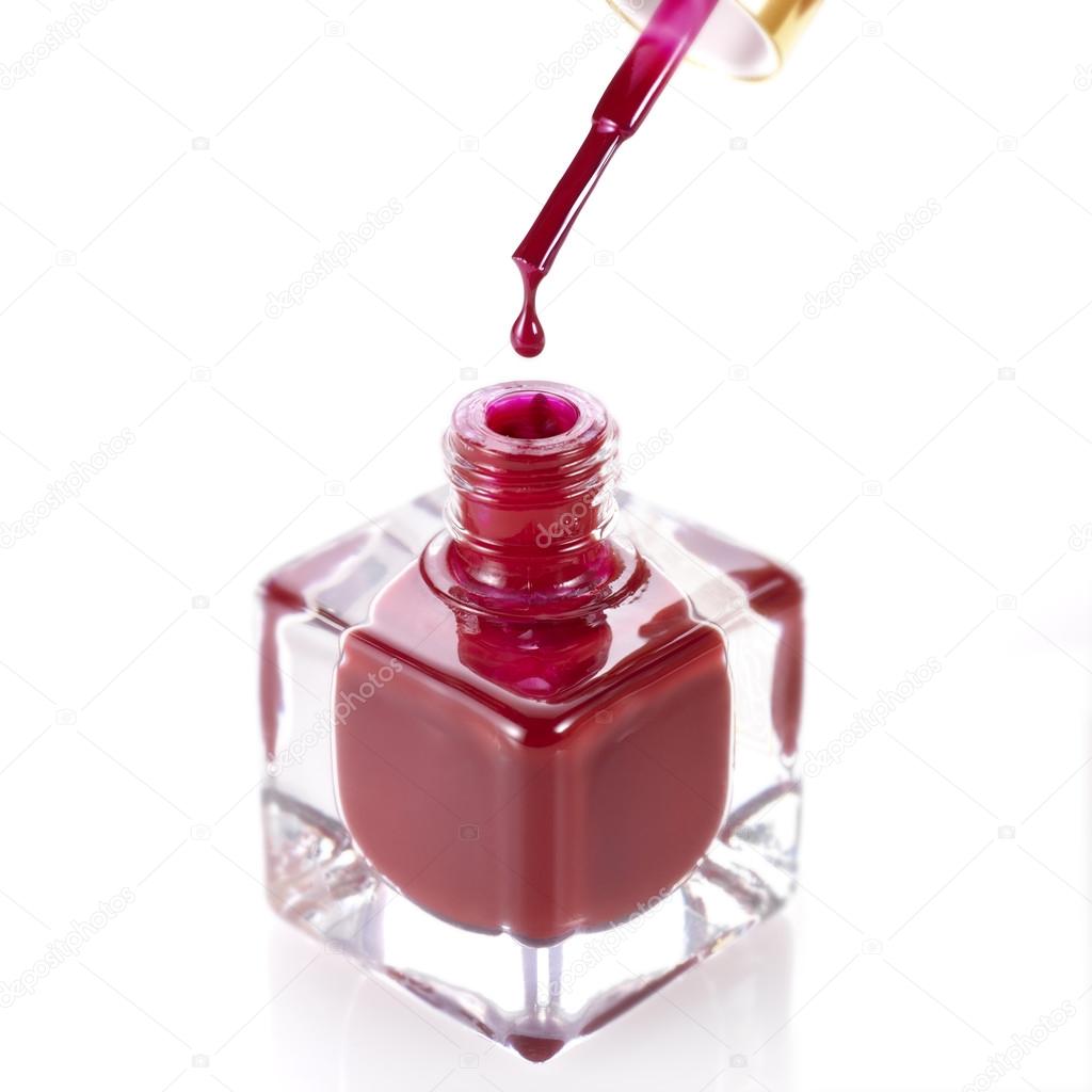 Red color nail polish bottle