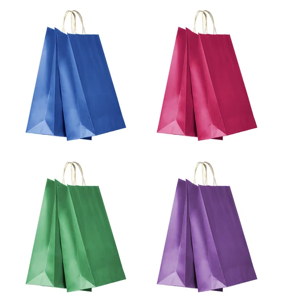 Τέσσερις χρωματικές τσάντες αγορών — Φωτογραφία Αρχείου
