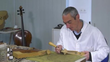 Luthier heykeltraşlık çello kelle 