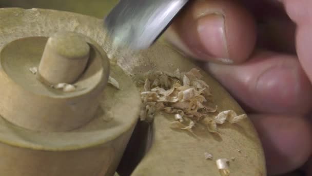 Luthier sculpt a cello head — Stock Video