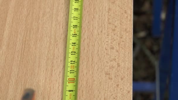 Drawing measure point with a  measuring tape and pencil — Stock Video