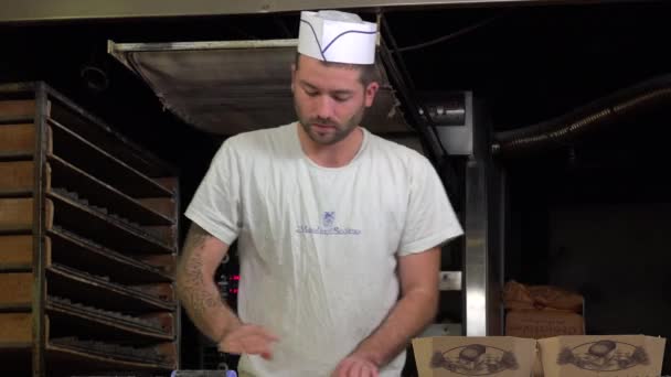 Braiding brioche dough portions — Stock Video
