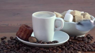 Espresso kahve, şeker ve küçük kek