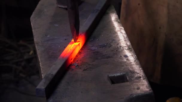 Blacksmith artist in his workshop — Stock Video