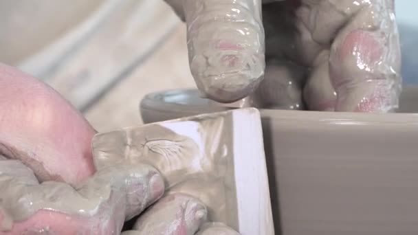 Potter working with clay on a lathe — Stock Video