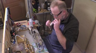 Repairer pirinç ve ahşap Rüzgar aletleri