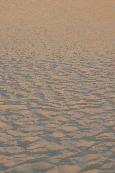 Песчаная текстура фона — стоковое фото