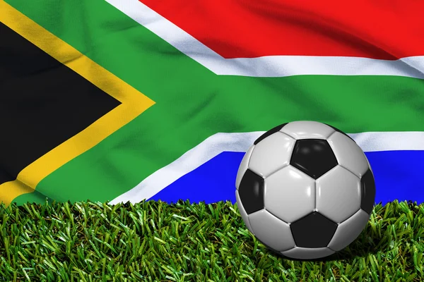 Pelota de fútbol sobre hierba con fondo de bandera de Sudáfrica, representación 3D —  Fotos de Stock