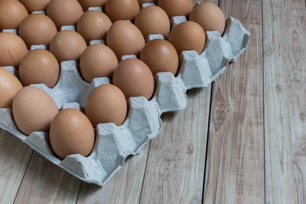 Absent concept : An egg disappears from the group of eggs. — Stock Photo, Image