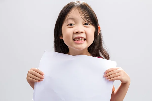Young Girl Holding Blank Paper / Young Girl Holding Blank Paper Background / Isolated Young Girl Holding Blank White Paper — Stock Photo, Image