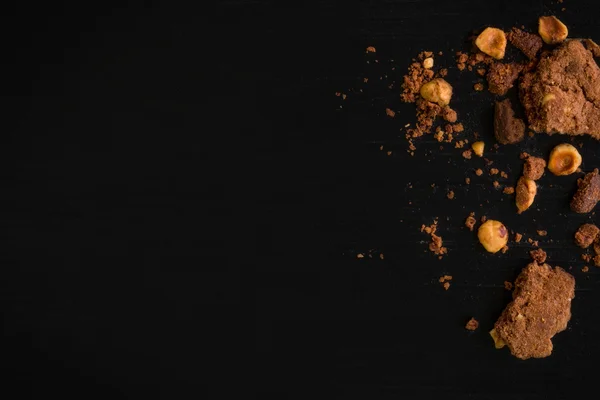 Cookie Crumbs Background / Cookie Crumbs / Cookie Crumbs on Black Background — Stock Photo, Image