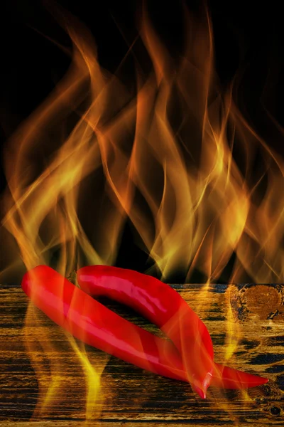 Chili on Fire / Chili / Chili on Fire over Black Background — Stock Photo, Image