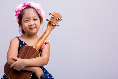Ukulele ile çocuk