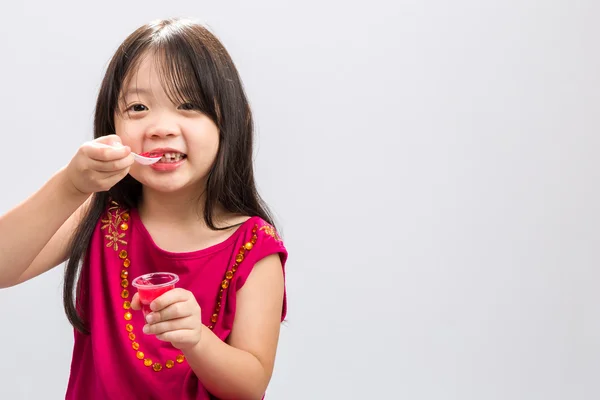 Kid Eating Gelatin Dessert — стокове фото