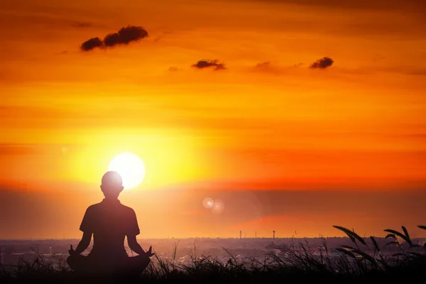 Silhouette of young women yoga at the sunset on hill. — Stock Photo, Image