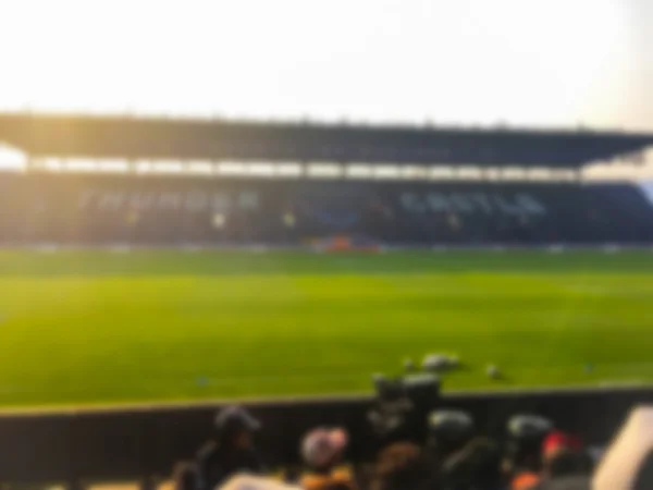 Wazig-gerichte stadion voetbal in de avond-achtergrond. — Stockfoto