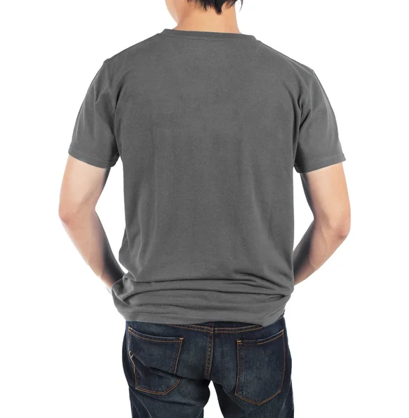 Close-up van de mens in terug grijs shirt op witte achtergrond. — Stockfoto