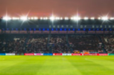 Bulanık de-odaklı Stadyumu futbol alacakaranlık arka plan.