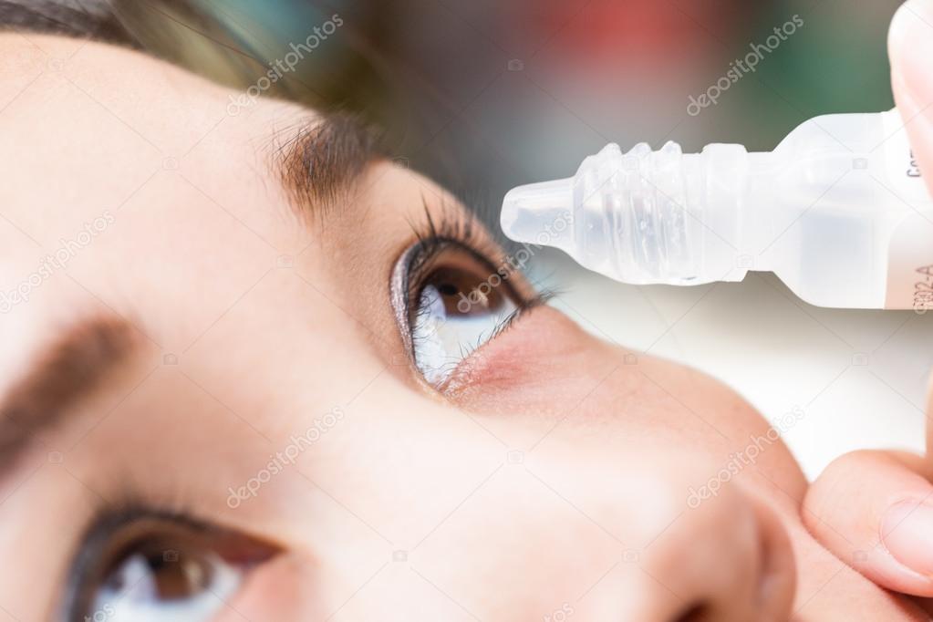 Close up drips into eye cataract medication.