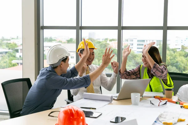 Group Young Engineer Team Giving High Five Celebrating Success Office Royalty Free Stock Photos