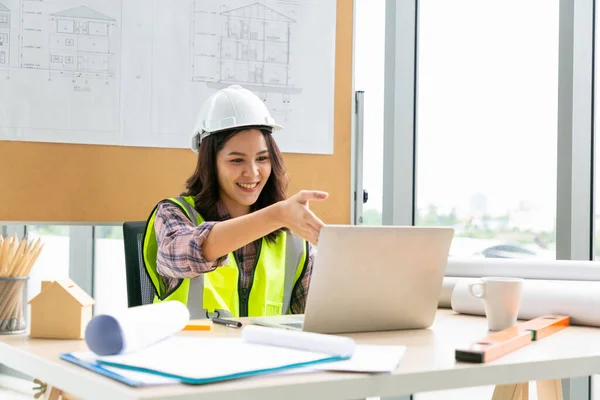 Young Engineers Waving While Having Online Meeting Laptop Office Stock Photo