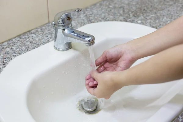 Washing hand on sink — Stock Photo, Image