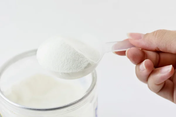 Collagen protein powder on spoon measure isolate on white backgr — Stock Fotó