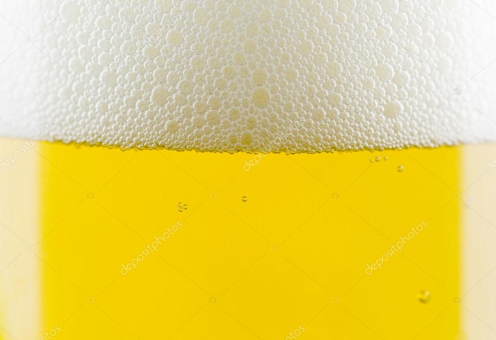 Beer bubbles close-up in glass.