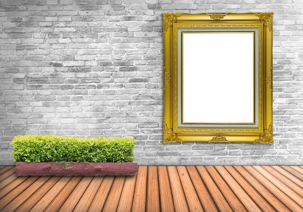 Big Blank frame vintage on a concrete wall with tree pot on wood — Stockfoto