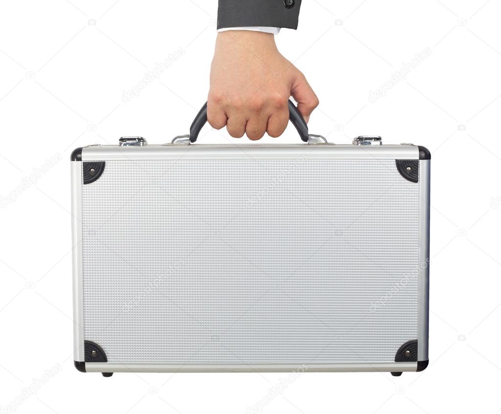 Hand and arm holding silver luggage or brief case isolated on wh