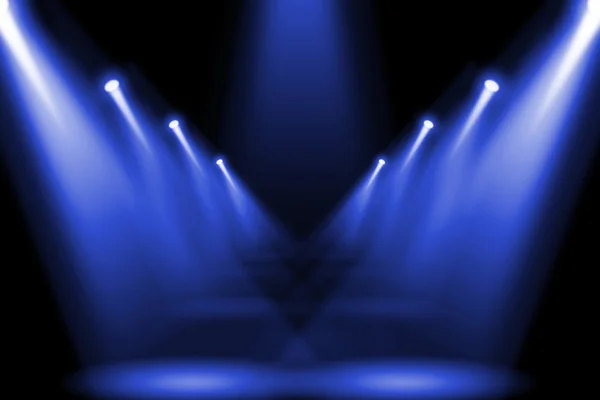 Abstract blue purple lighting flare on the floor center stage. — Stockfoto