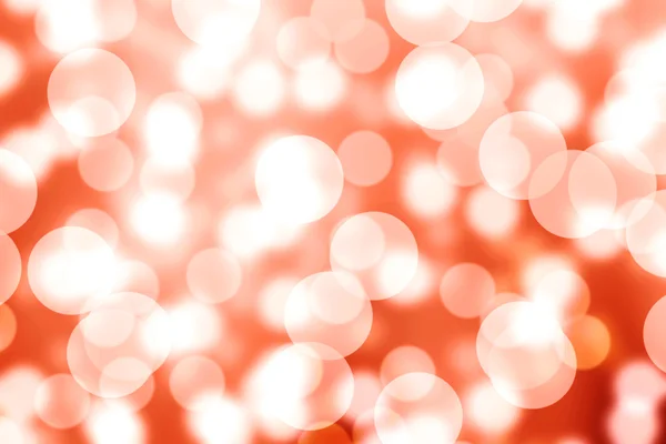 Abstrakte Bokeh orange Licht Hintergrund Textur. — Stockfoto