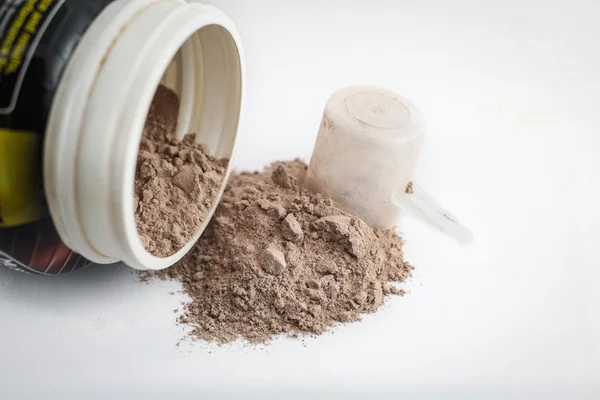 Spoon measure Whey protein chocolate powder for fitness and body Stock Image