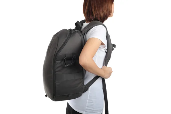 Junge Frau trägt mit Reiserucksack isolierten weißen Rucksack — Stockfoto