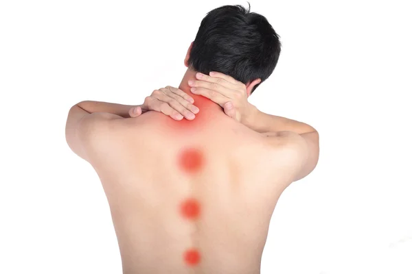 Junger Mann hält Rücken und Nacken an diesem Schmerz fest. — Stockfoto