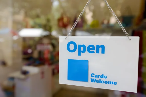 Sign open hang inside mirror shop. — Stock Photo, Image