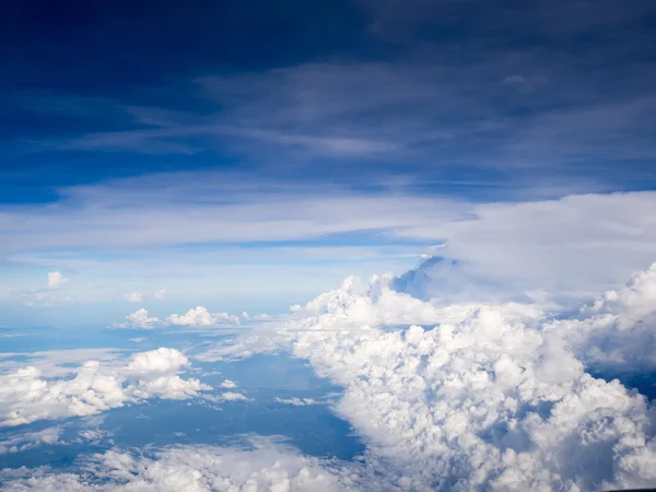 Cool soft unique white cloud and blue sky view from window of airplane while flying over Thailand. — Stock Photo, Image