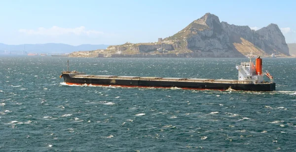 Cargo ship passing Gibraltar — Stock Photo, Image