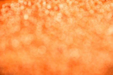 Turuncu şenlikli glitter hafif bulanıklık arka plan