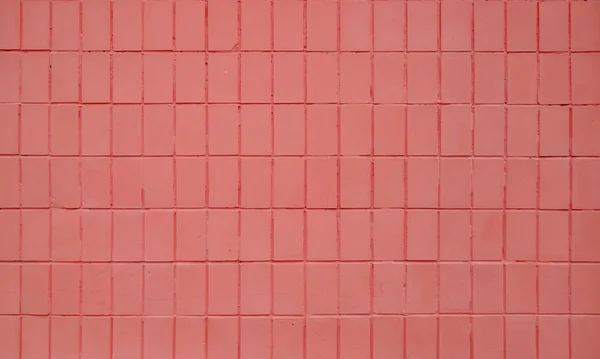 Pink painted ceramic tile wall texture